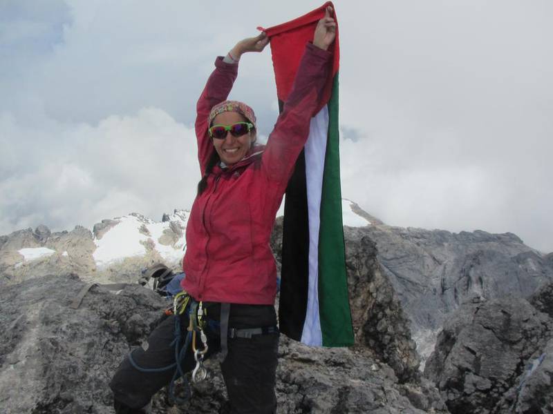 Suzanne Al Houby carried her nation’s colours to the top of Cartstensz, Indonesia, the highest summit of Oceania. Courtesy Suzanne Al Houby