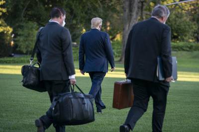 US President Donald Trump walks on the South Lawn of the White House before boarding Marine One. Bloomberg