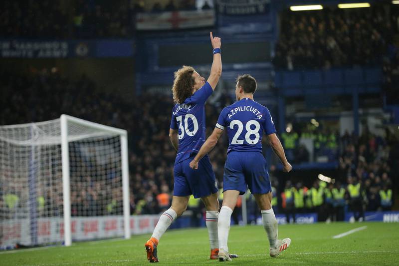 David Luiz, left, celebrates with his teammate Chelsea's Cesar Azpilicueta. AP Photo