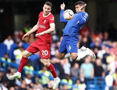  Chelsea defender Thiago Silva controls the ball under pressure from Liverpool's Diogo Jota. AFP
