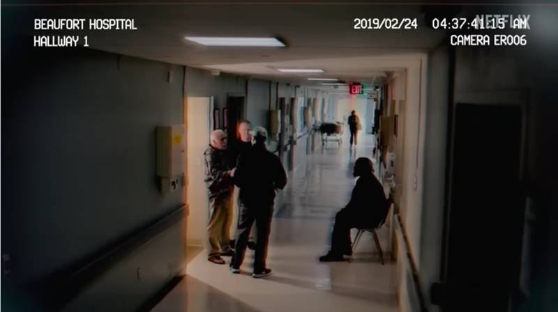 Paul's father Alex and grandfather Randolph captured on hospital CCTV speaking with law enforcement, before they would point the finger at Connor Cook. Photo: Netflix