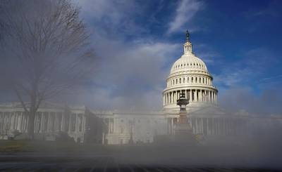 Steam rises from a vent outside the US Capitol on the day the House of Representatives is expected to vote on legislation to provide $1.9 trillion in new coronavirus relief in Washington, US. Reuters
