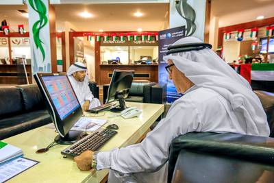 Traders work at the Dubai Financial Market. GCC IPOs have thrived despite global challenges and the UAE has played a substantial role in this market. Victor Besa / National