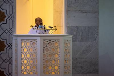 An imam delivers a sermon at Namira Mosque. REUTERS