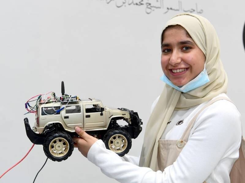 Mariam with one of her many inventions designed to boost safety and improve lives. Photo: Mariam Alghafri