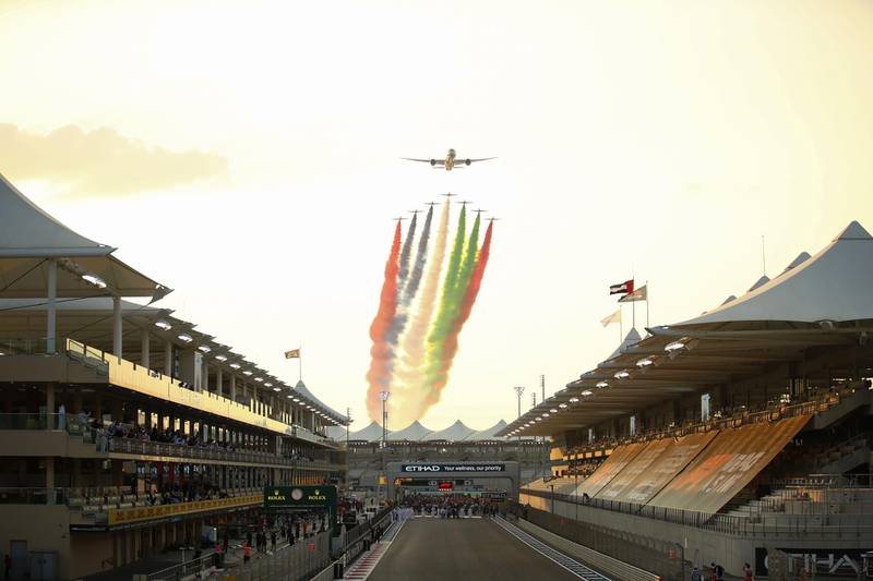An Etihad jet flies over the circuit ahead of the Grand Prix.  AFP
