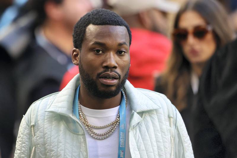 MIAMI, FLORIDA - FEBRUARY 02: American rapper Meek Mill looks on before Super Bowl LIV at Hard Rock Stadium on February 02, 2020 in Miami, Florida.   Ronald Martinez/Getty Images/AFP