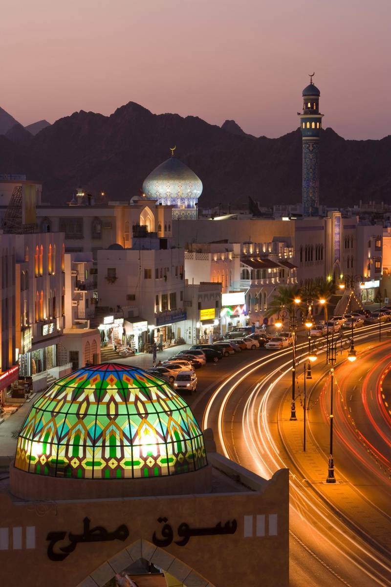 10/12/2007, Muscat, Oman --- Elevated dusk view along the Corniche, stained glass dome of Mutrah Souq --- Image by © Gavin Hellier/Robert Harding World Imagery/Corbis