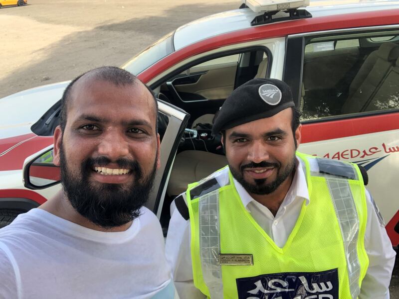 Peace advocate Nitin Sonawane was offered water by Ras Al Khaimah Police as he walked from the Northern Emirates to Abu Dhabi this week. Photo: Nitin Sonawane