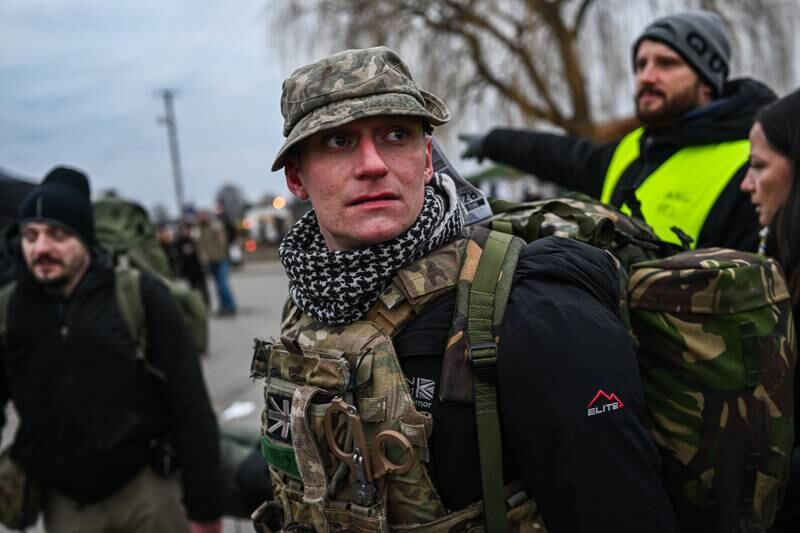 'Alex' from the UK arrives at the Polish-Ukrainian border looking for transport to Lviv to join the fight. Getty Images