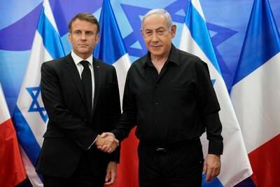 Israeli Prime Minister Benjamin Netanyahu, right, welcomes French President Emmanuel Macron before their talks in Jerusalem. AP