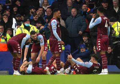 Aston Villa's Lucas Digne and Matty Cash were hit by an object from the crowd at Goodison Park. PA