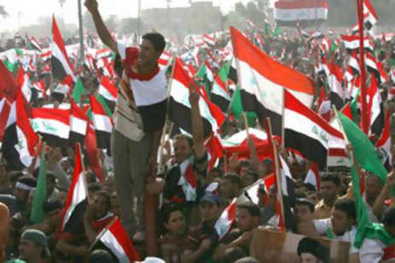 Followers of Shiite cleric Muqtada al-Sadr take part in a rally in Baghdad, Iraq, on Saturday, Oct. 18,2008, to protest a draft U.S.-Iraqi security agreement. The mass show of opposition comes as the United States and Iraqi leaders try to build support for the accord that would extend the presence of American forces in Iraq beyond the end of this year. (AP Photo/Hadi Mizban) *** Local Caption ***  BAG118_Iraq_Anti_US_Protest.jpg