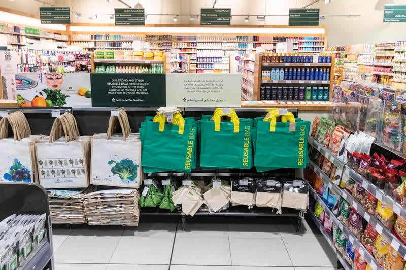 A ban on single-use shopping bags in Abu Dhabi and a charge for them in Dubai will see supermarkets focus on reusable bags. Antonie Robertson / The National
