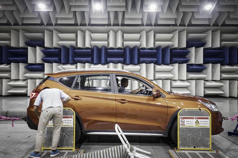 A vehicle sits in an acoustics testing lab at the BYD Co. headquarters in Shenzhen, China, on Thursday, Sept. 21, 2017. China will likely order an end to sales of all polluting vehicles by 2030, BYD's Chairman Wang Chuanfu predicted, spurring the nation's leading maker of electric cars to consider supplying batteries to competitors during the powertrain transformation. Photographer: Qilai Shen/Bloomberg