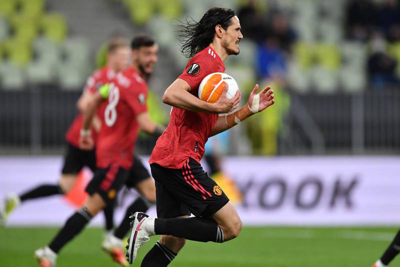 Edinson Cavani picks up the ball after scoring the equaliser for Manchester United during the Europa League final. EPA
