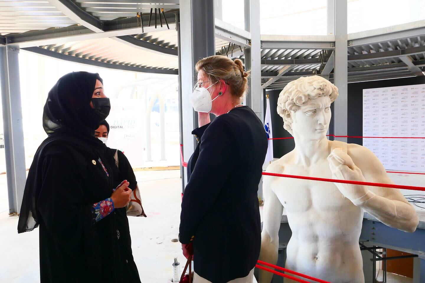 Reem Al Hashimy, UAE Minister of State for International Cooperation and Cecilie Hollberg, director of the Galleria dell’Accademia Di Firenze, the museum that is home to the original of Michelangelo’s David during the unveiling ceremony of David statue at the Italy pavilion at EXPO 2020 site in Dubai on April 27,2021.  (Pawan Singh/The National) Story by Ramola