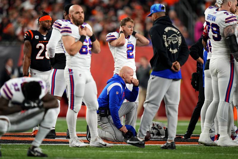Buffalo Bills head coach Sean McDermott takes a knee. USA Today