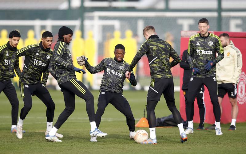 Manchester United's Tyrell Malacia with teammates. Reuters 