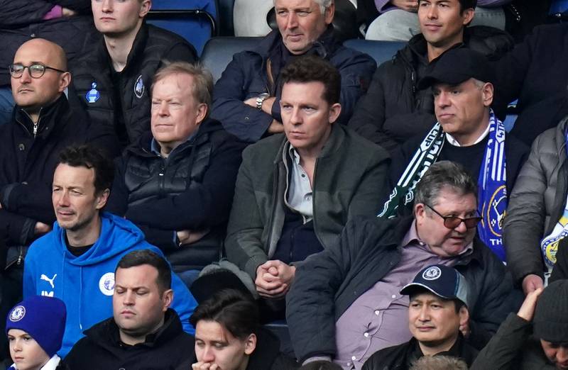 Nick Candy, centre, attends Chelsea's Premier League match against Newcastle at Stamford Bridge. PA
