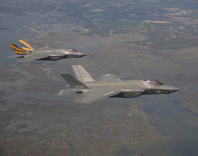 F-35C Lightning IIs on a  test flight in the Atlantic test range. The programme is now the most expensive in US military history. Lockheed has pledged to cut costs. AFP