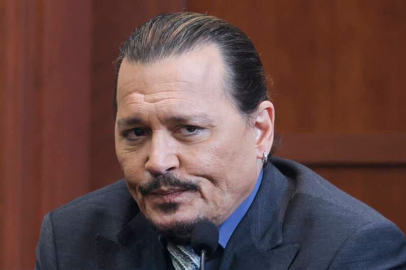 Depp gives evidence in the courtroom on Wednesday. AP
