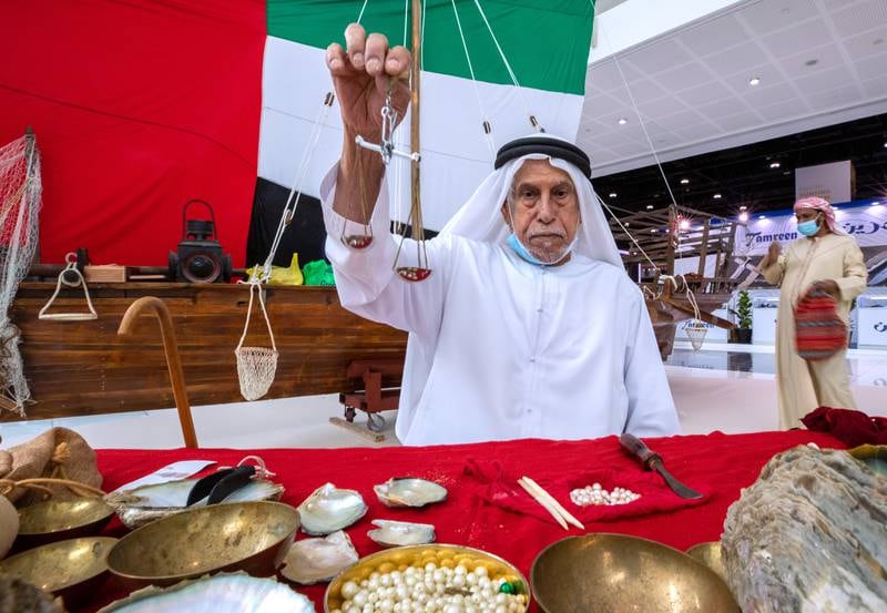 Hathbor Al Rumaithi, a pearl diver from Ras Al Khaimah, attends Adihex. Victor Besa / The National