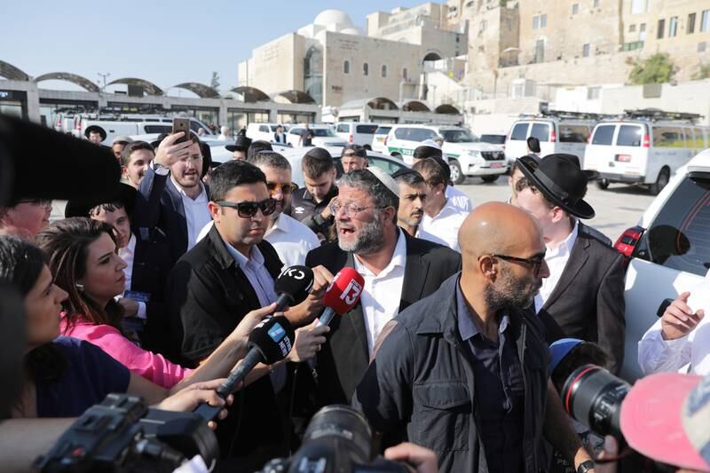 Israeli extreme-right politician Itamar Ben Gvir, centre, speaks to the media as he makes his way to the Al Aqsa complex in East Jerusalem. EPA