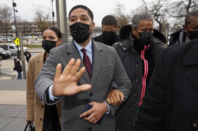 Actor Jussie Smollett arrives with his mother Janet at a Chicago court on December 1. The former 'Empire' actor is accused of lying to police when he reported he was the victim of a racist, anti-gay attack in downtown Chicago nearly three years ago. AP