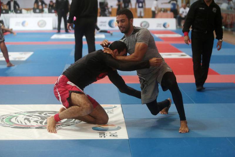 Basel Fanous, left, of Jordan fights Brahim Dakir of Morocco during their brown open weight quarter-final match in the Ramadan Cup during the AFOCH 19th Open Sports Festival at the Armed Forces Officers Club in Abu Dhabi on Saturday. Christopher Pike / The National