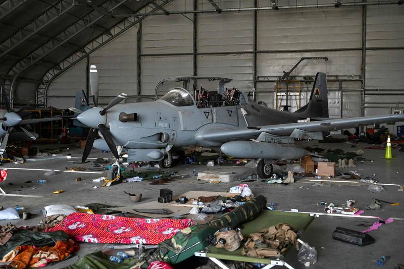 An Afghan Air Force A-29 attack aircraft is pictured inside a hangar at the airport in Kabul, after the US pulled all its troops out of the country, AFP
