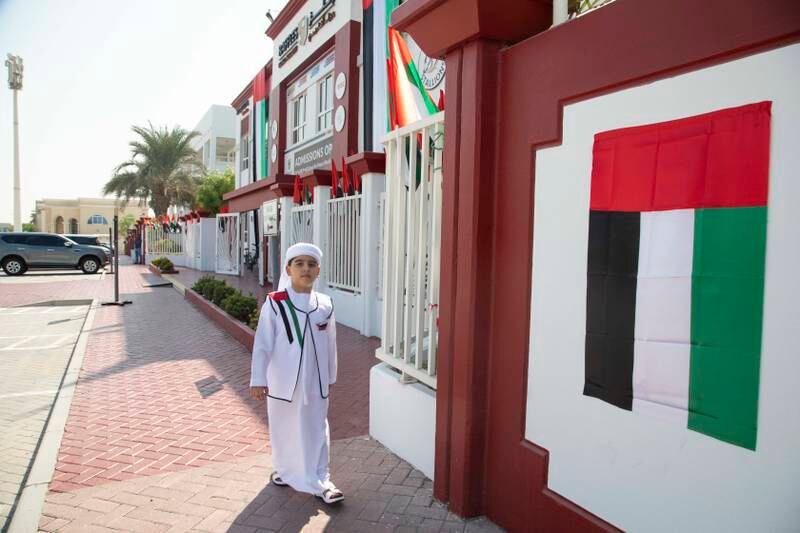 A pupil celebrating the flag day at Raffles World Academy in Dubai. Ruel Pableo / The National