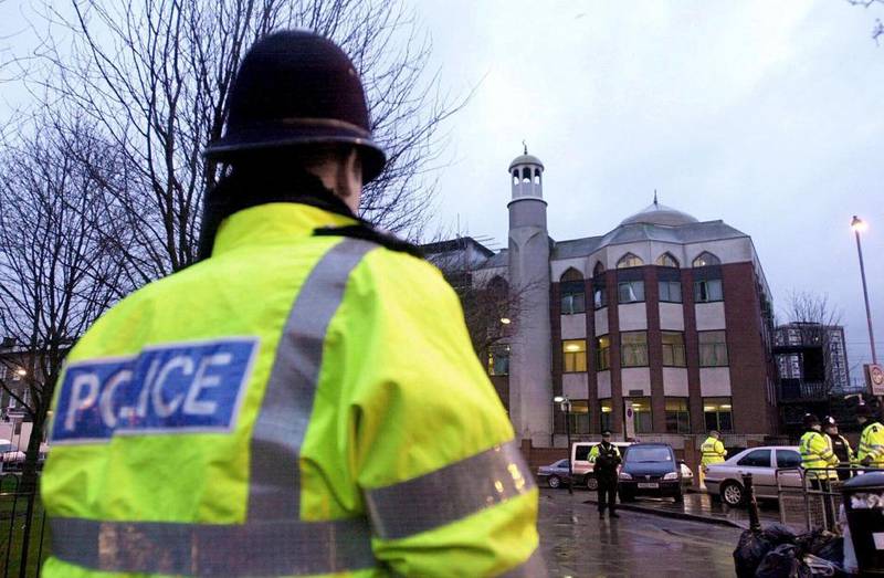 A police officer stands in front of Finsbury Park Mosque in London. EPA