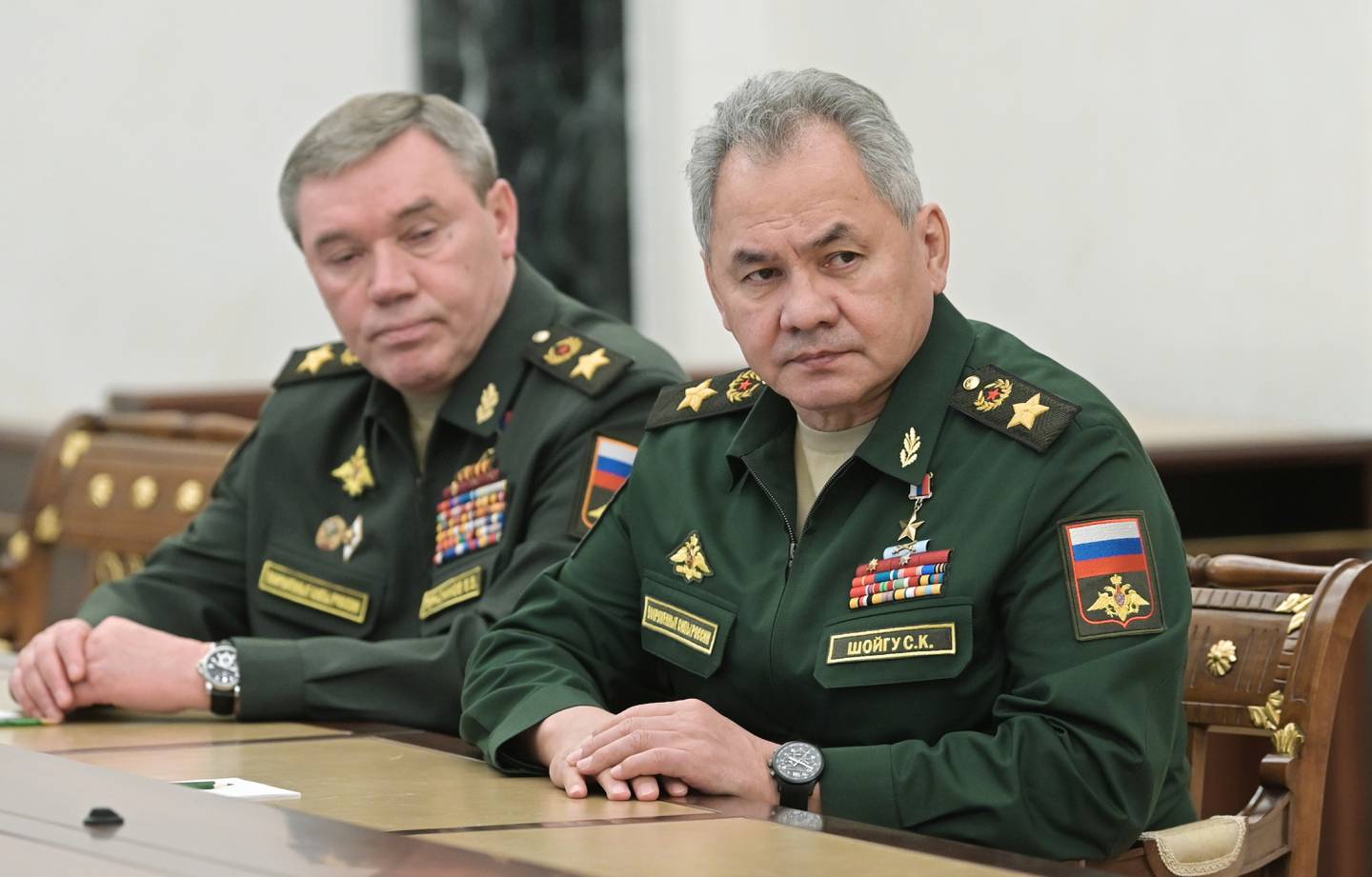 Russian Defence Minister Sergey Shoigu, right, and First Deputy Defence Minister Valery Gerasimov at a meeting with President Vladimir Putin in Moscow on February 27. AP