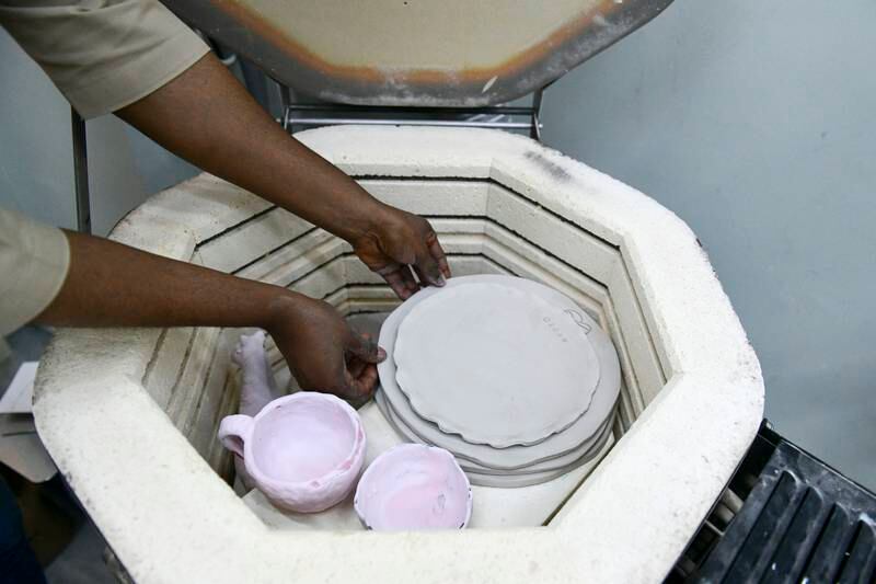 Items being placed in the kiln.