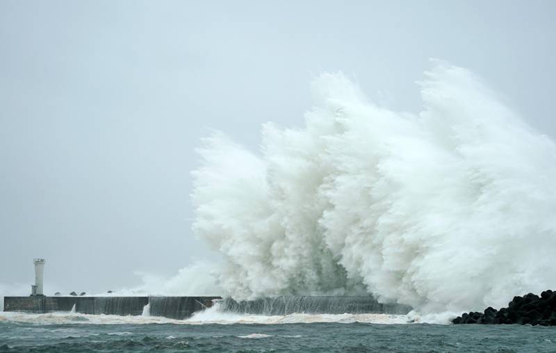 Surging waves generated by Typhoon Hagibis hit against a breakwater at a port in the town of Kiho, Mie Prefecture, Japan. EPA