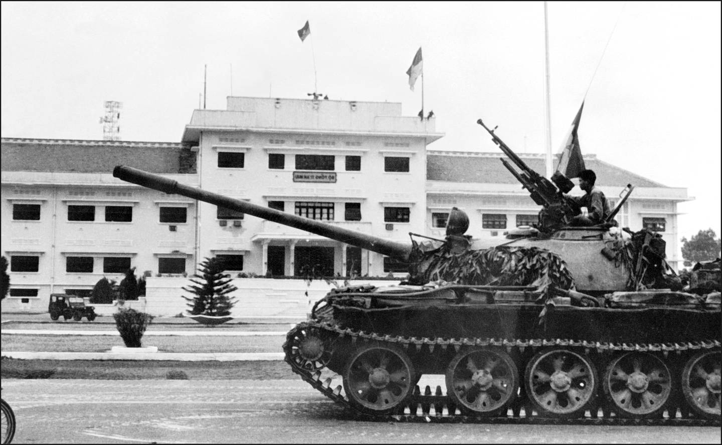 A North Vietnamese Army tank penetrates the last South Vietnamese stronghold, the presidential palace in Saigon, in 1975. AFP