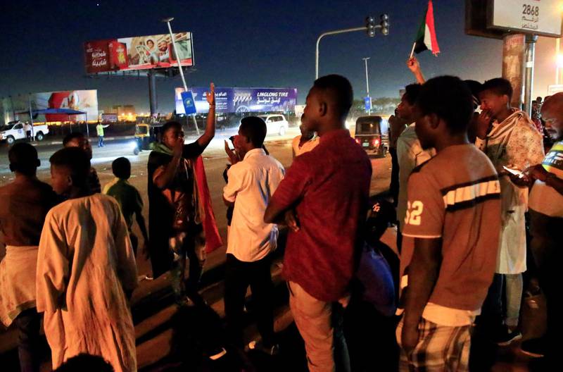 Civilians gather near the area where gunmen opened fire outside buildings used by Sudan's National Intelligence and Security Service (NISS) in Khartoum, Sudan January 14, 2020. REUTERS/Mohamed Nureldin Abdallah