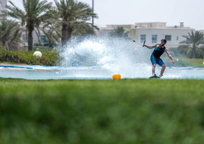 Abu Dhabi, United Arab Emirates, June 21, 2019.  Weather images.  Beating the heat at Al Forsan wakeboarding cable park. --  Rob Dam in action.Victor Besa/The NationalSection:  NAReporter: