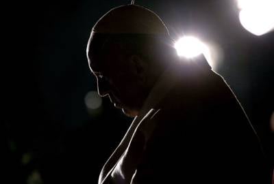 Pope Francis during the Stations of the Cross at the Colosseum in March 2018 in Rome. Getty Images