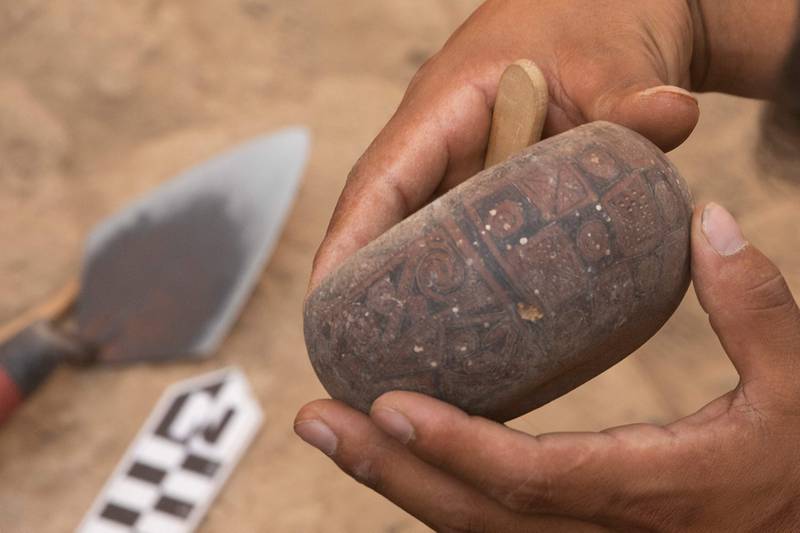 A decorated calabash found at the Cajamarquilla archaeological complex in Peru. AFP