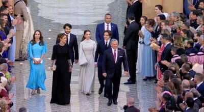 King Abdullah, Queen Rania, Prince Hashem, Princess Salma and Princess Iman arrive at Al Husseiniya Palace after the royal wedding. Reuters