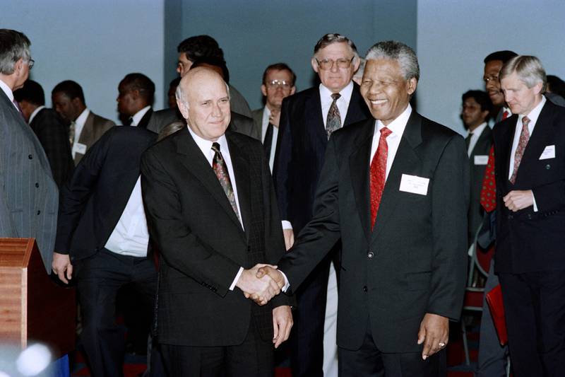 On September 26, 1992, African National Congress president Nelson Mandela and President FW de Klerk met to discuss ways to prevent political violence in South Africa. AFP