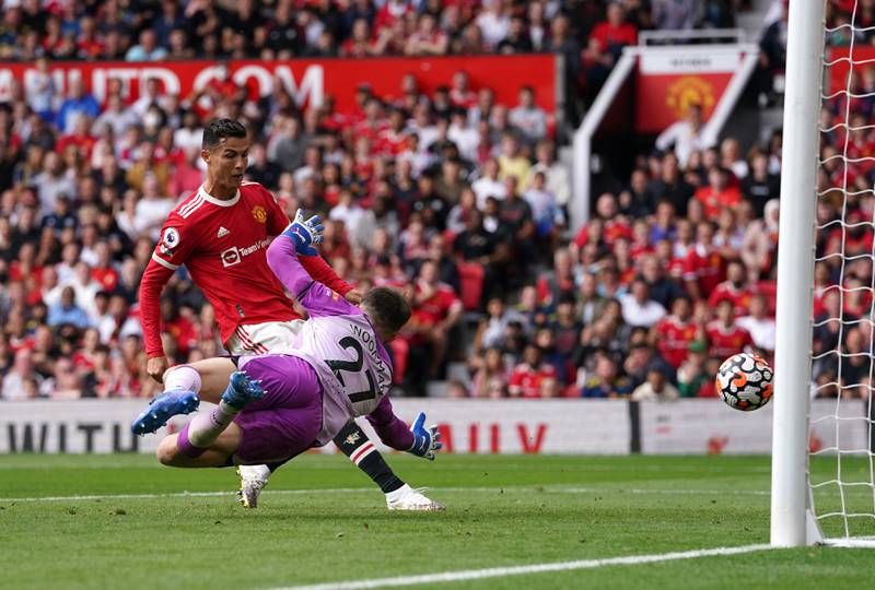Cristiano Ronaldo scores Manchester United's first goal. PA