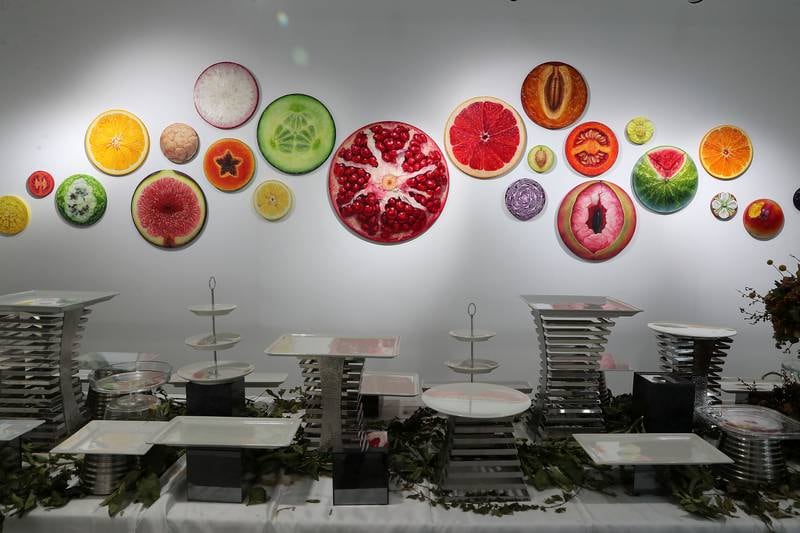 Oil paintings of cross-sections of fruits and vegetables