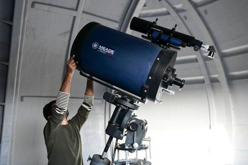 Visitors can look into space through the telescope and ask questions of the experienced astronomers