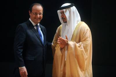 Sheikh Sultan bin Tahnoon, chairman of the Abu Dhabi Tourism and Culture Authority with the French president, Francois Hollande, during the inauguration of the Birth of a Museum exhibition in April. Antoine Antoniol for The National