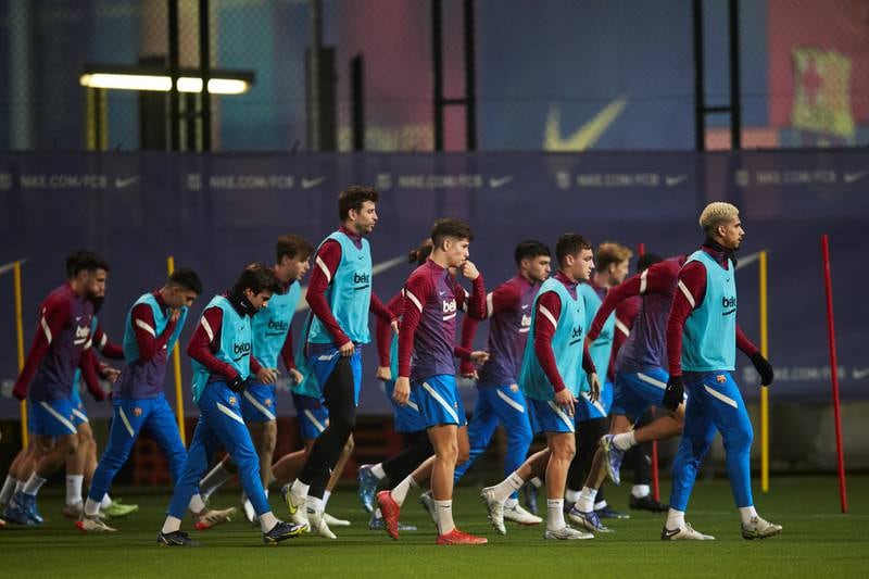 Barcelona players attend a training session. EPA