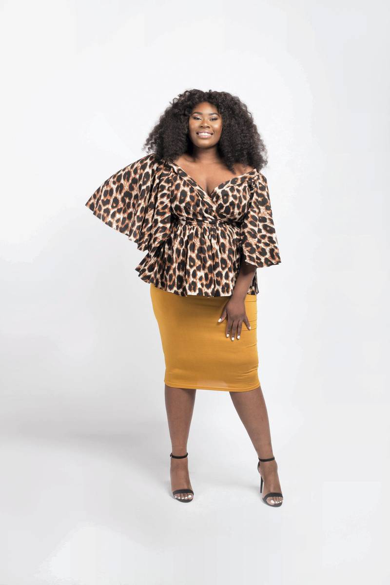 Nojima leopard-print wrap blouse, worn with Ojoma mid-length bodycon skirt in a stretch, ribbed texture fabric from from Dear Curves 
