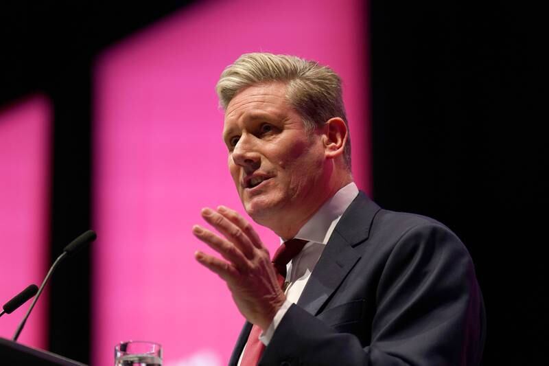 Mr Starmer gestures during his speech. Getty Images